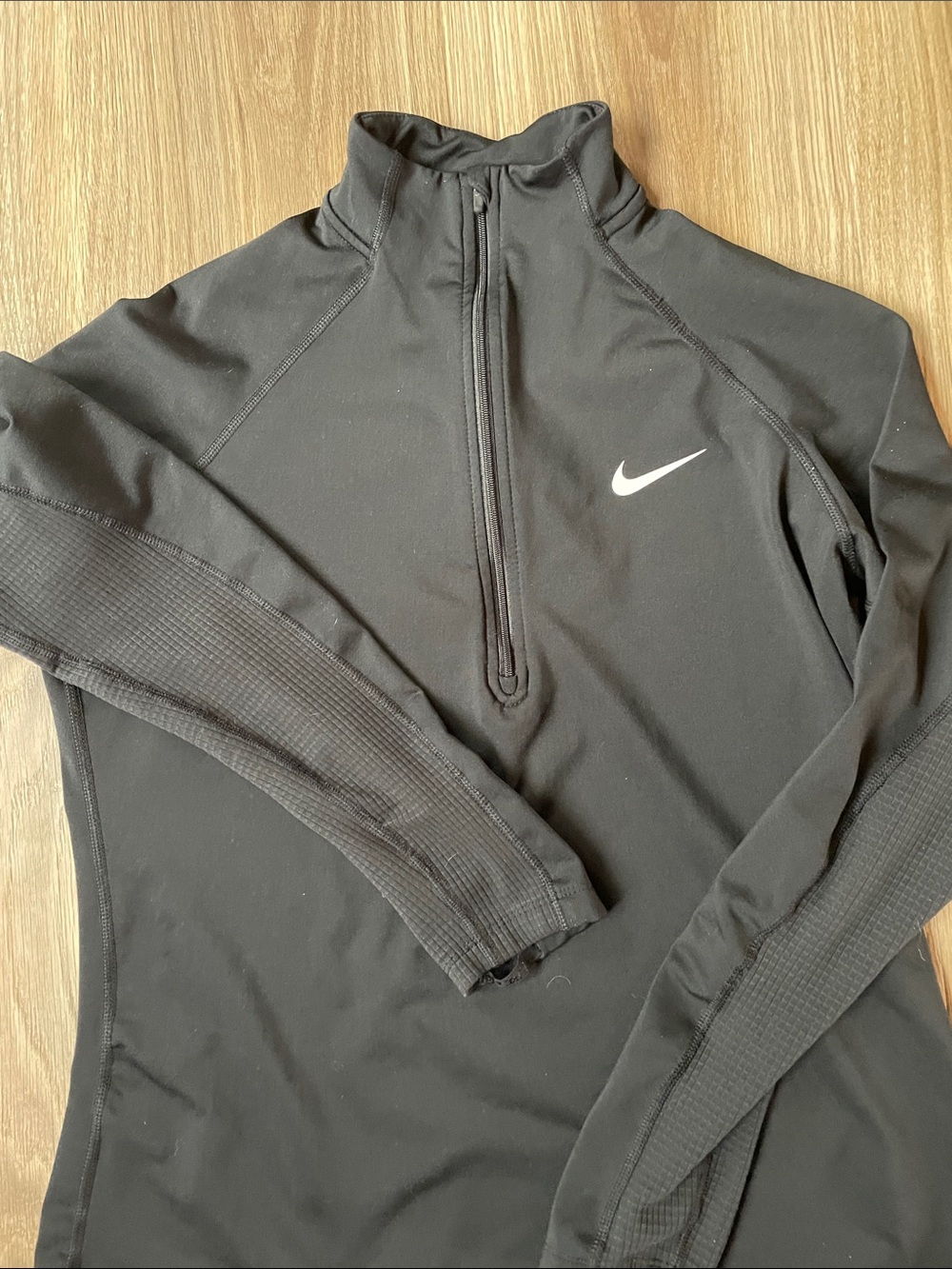 Nike Black Quarter-Zip Athletic Top with White Swoosh